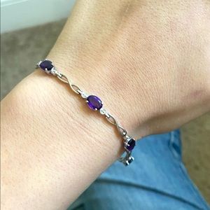 Lab created amethyst, infinity sign sterling silver bracelet.